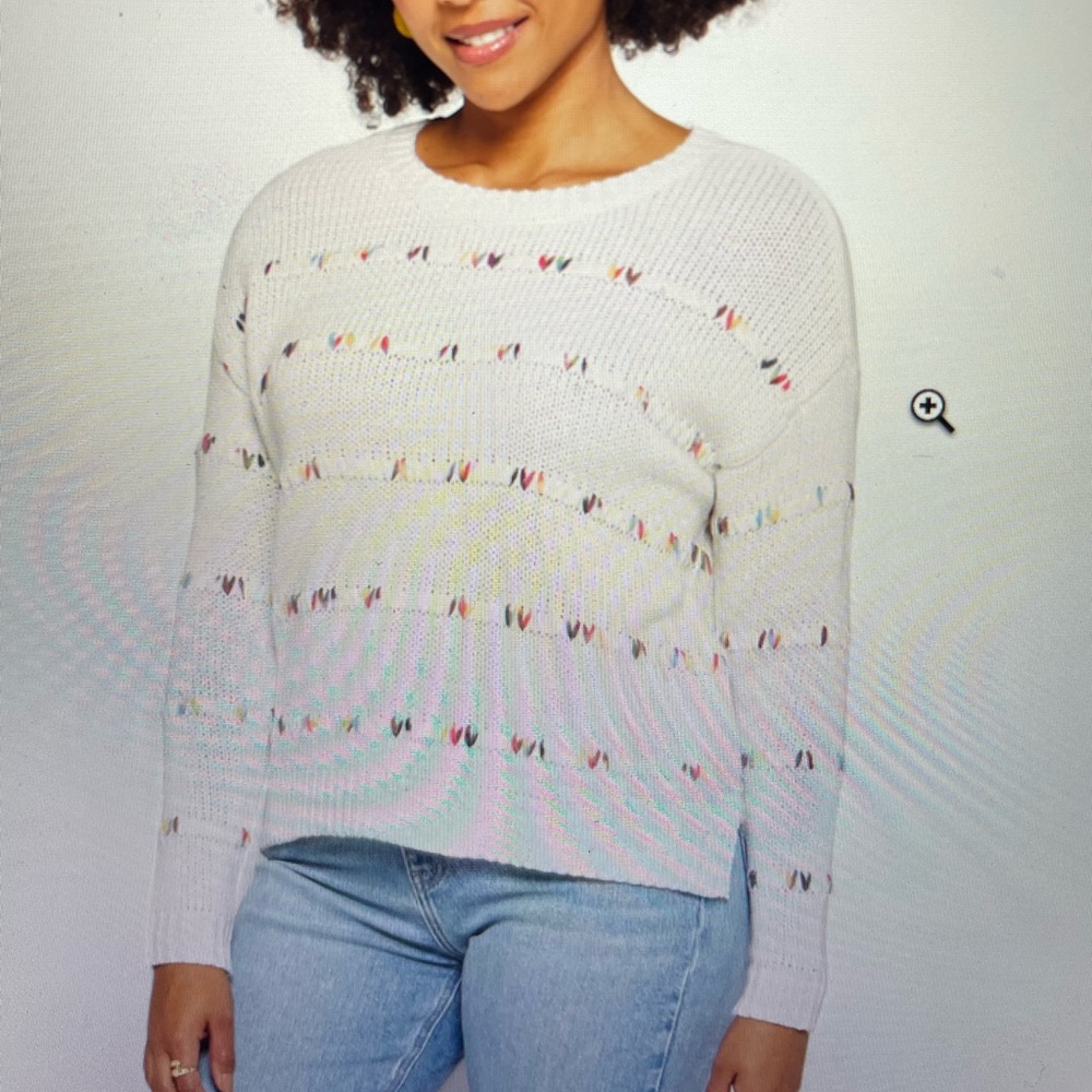 White sweater with multi color accents
